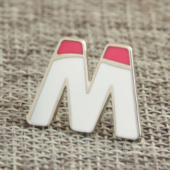 Custom “M” Enamel pins